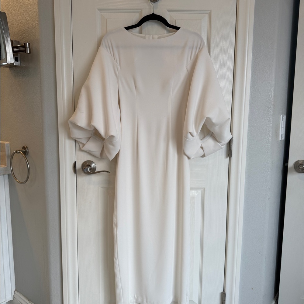Elegant White Dress with Statement Sleeves